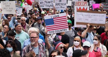 Woman charged in connection to anti-ICE protest where car drove through crowd