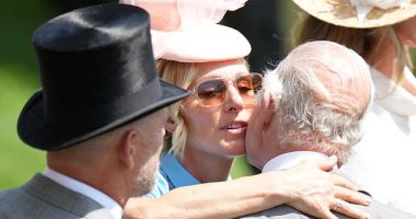 Zara Tindall pecks the King on the cheek as she warmly greets her uncle at Royal Ascot