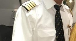 Portrait of Captain Sumeet Sabharwal in a pilot uniform.