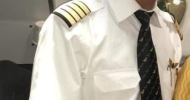 Portrait of Captain Sumeet Sabharwal in a pilot uniform.