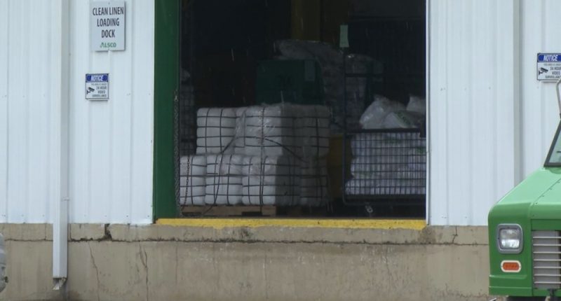 Laundry shipment at a loading dock.
