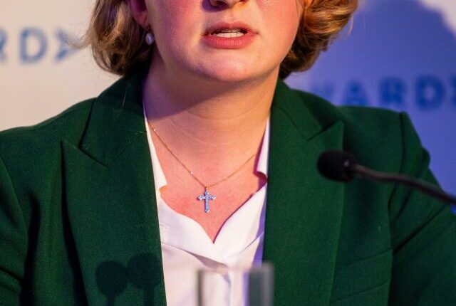 Katie Lam MP speaking at a conference.