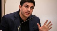 Hossein Nayeri speaks into a mic.