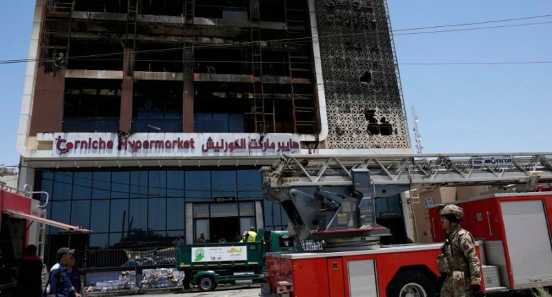 A fire at a shopping center in eastern Iraq kills more than 60 people