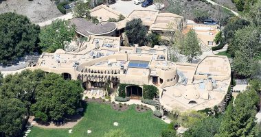 A-lister mansion that takes up a ZIPCODE... with mysterious symbols