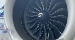 Damaged airplane engine casing.
