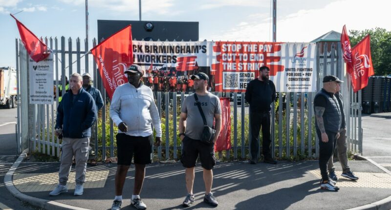 Striking Birmingham refuse collectors on picket line.