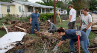 Armies of Texas volunteers dig out, clean up, after fatal floods