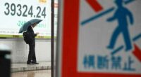 Asian shares are mixed after S&P 500 and Nasdaq composite pull back from their all-time highs