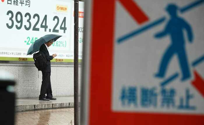 Asian shares are mixed after S&P 500 and Nasdaq composite pull back from their all-time highs