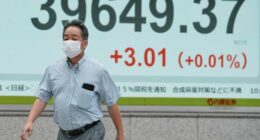 Asian shares are mixed after Wall Street closes higher and edges to more records