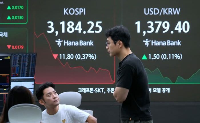 Asian shares are mixed after Wall Street sets more records for US stocks