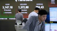Asian shares mostly gain after big tech rally on Wall Street