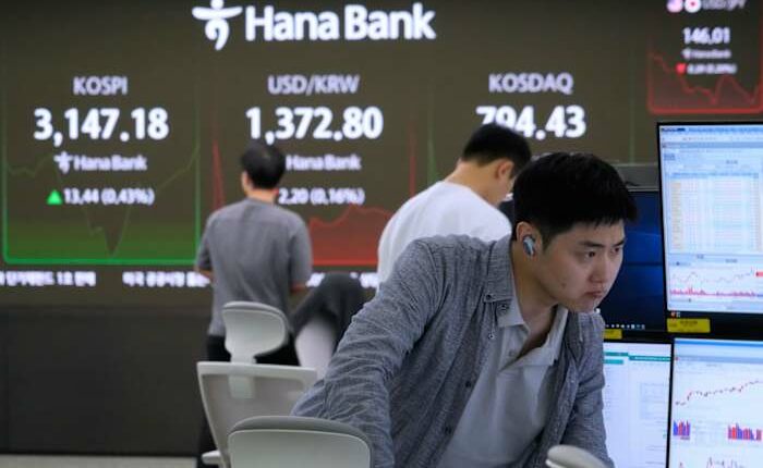 Asian shares mostly gain after big tech rally on Wall Street