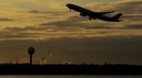 A Brisbane man who was accused of making a bomb threat while onboard a flight has been fined $1700 after he travelled under a fake name.