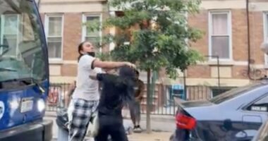Street brawl between several women over a parking spot.