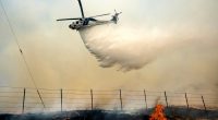 California's largest blaze explodes in size as dry, hot weather raises wildfire risk statewide