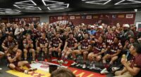 Can you spot the famous royal couple in this picture who were invited to join Queensland's State of Origin dressing room party as special guests of friend Billy Slater?