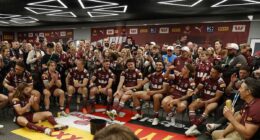 Can you spot the famous royal couple in this picture who were invited to join Queensland's State of Origin dressing room party as special guests of friend Billy Slater?