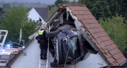 Car crashes into barn roof in Germany, seriously injuring two people