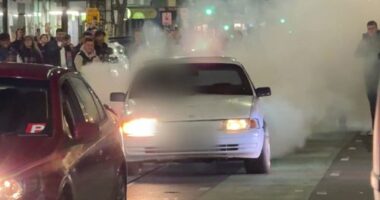 Chaos as car hoons takeover iconic Melbourne strip