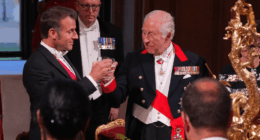King Charles III and Emmanuel Macron toasting.