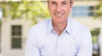 Portrait of a man smiling.