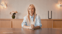 Gwyneth Paltrow sitting at a table.