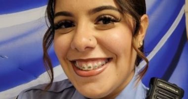 Portrait of a young New Orleans police officer.