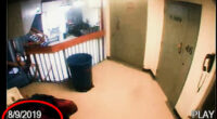 Security camera footage of a hallway.