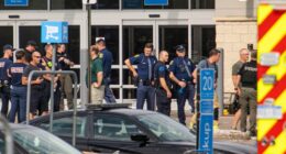 Law enforcement officers at a crime scene.