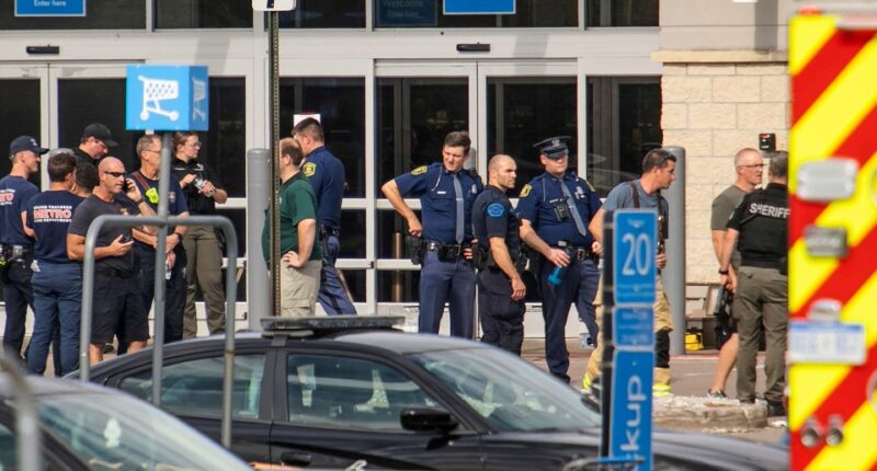 Law enforcement officers at a crime scene.