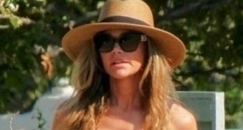 Denise Richards seen without wedding ring amid divorce