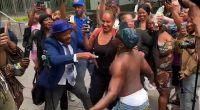 Diddy fans removed by riot police after spraying baby oil