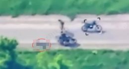 Graphic video footage of a Ukrainian prisoner of war being dragged along a road.