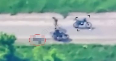 Graphic video footage of a Ukrainian prisoner of war being dragged along a road.