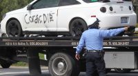 Disturbing message shooter, 27, wrote on side of car before opening fire on border agents near airport in ambush