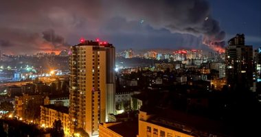 Kyiv at night with smoke rising after a missile strike
