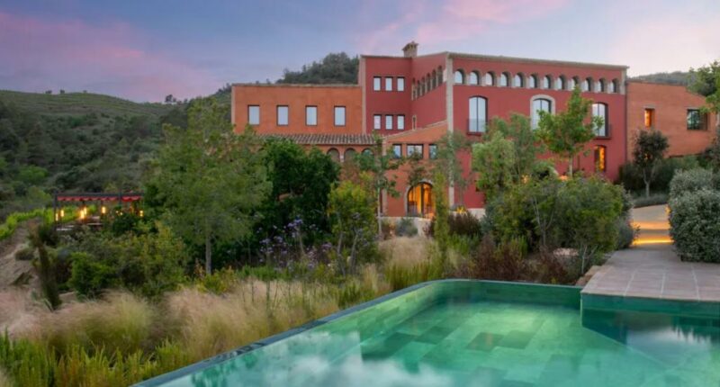 Explore Spain's prestigious Priorat wine region from this high-design hotel