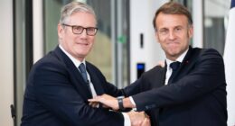 Keir Starmer and Emmanuel Macron shaking hands at a press conference.