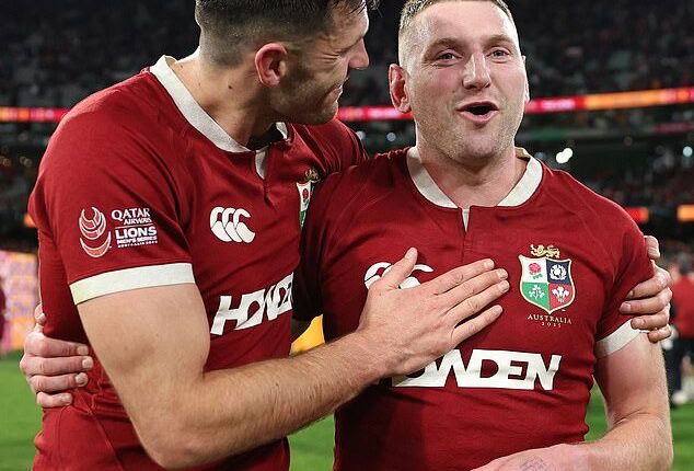 Blair Kinghorn and Finn Russell celebrate at full time after the win in Melbourne