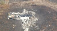 Aerial view of a burned-out airplane at London Southend Airport.