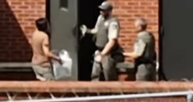 Ghislaine Maxwell seen carrying mystery box into prison