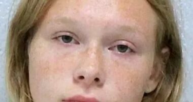 Mugshot of a young woman.