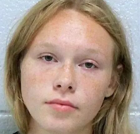 Mugshot of a young woman.