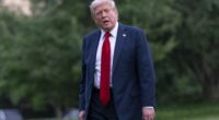President Donald Trump talks to reporters as he walks on the South Lawn upon arriving at the White House, Sunday, July 13, 2025, in Washington. (AP Photo/Jose Luis Magana)