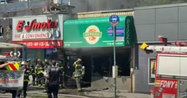 Firefighters responding to a fire at Singas Famous Pizza.