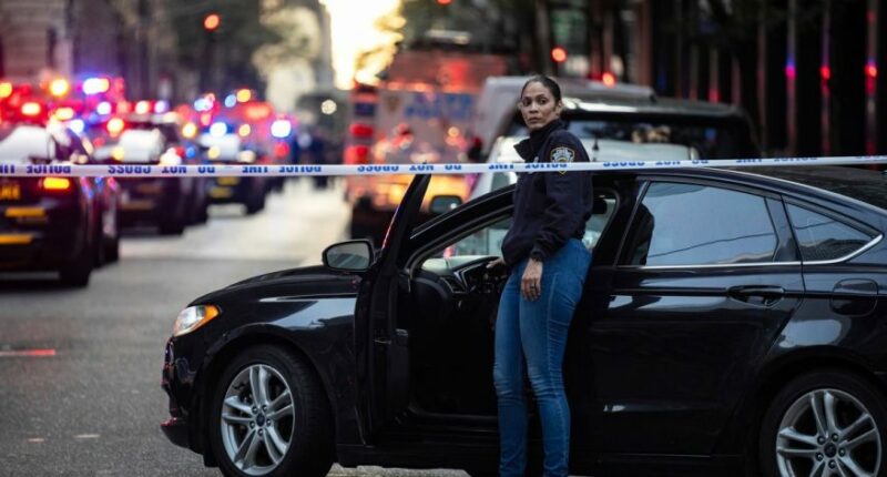 Gunman kills four, including NYPD officer, in Manhattan skyscraper shooting