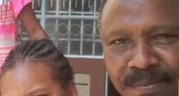 Photo of a man and his granddaughter.