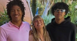 Heidi Klum is dwarfed by sons Henry, 19, and Johan, 18